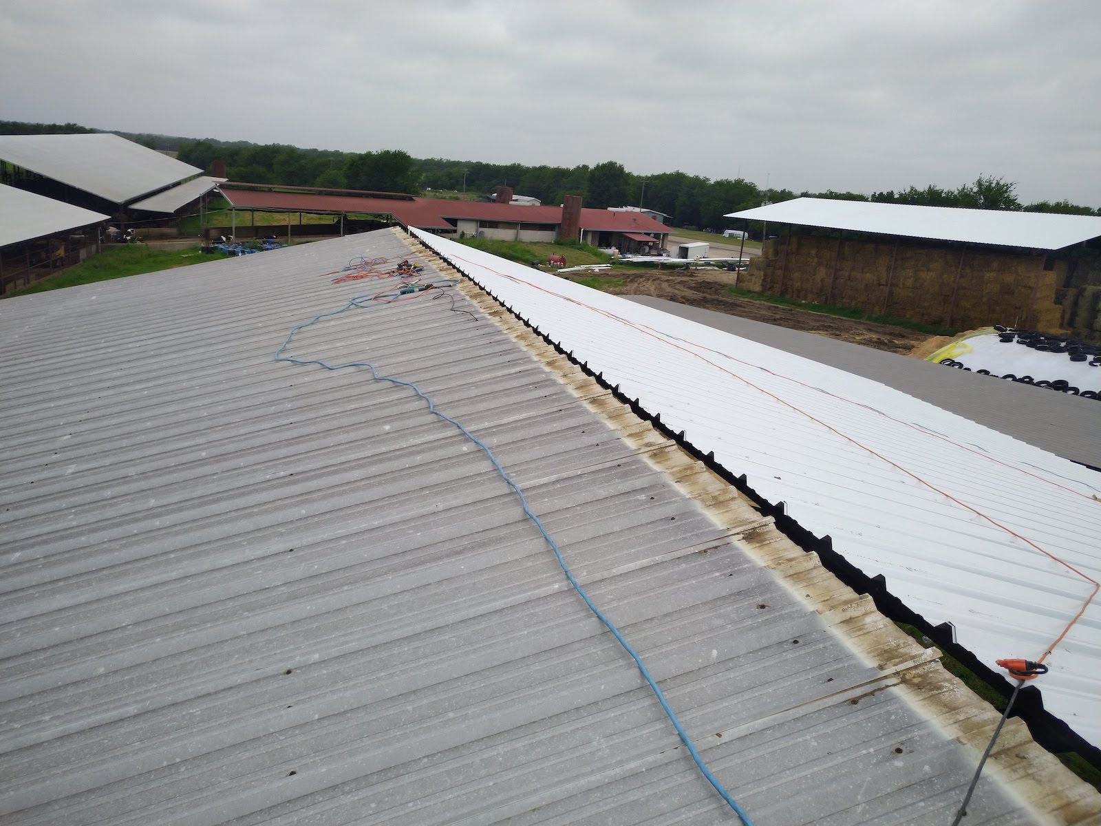 Metal farm commercial roof in Sulphur Springs before replacement